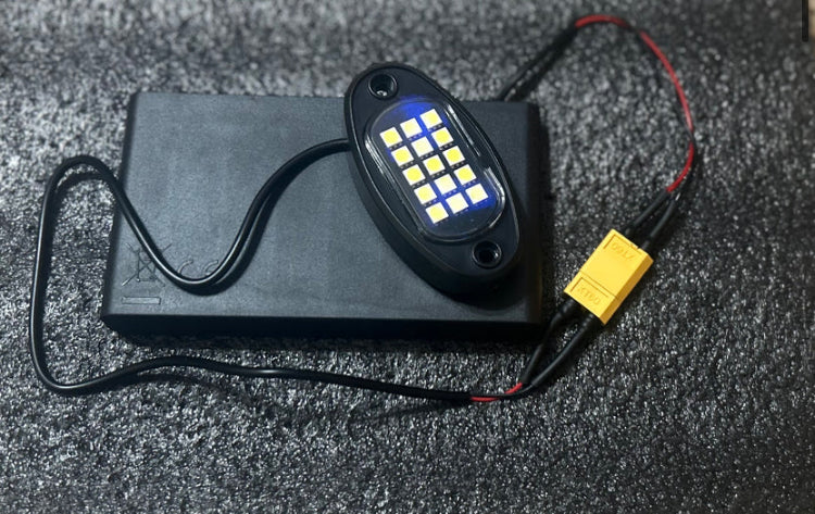 Battery powered rock light